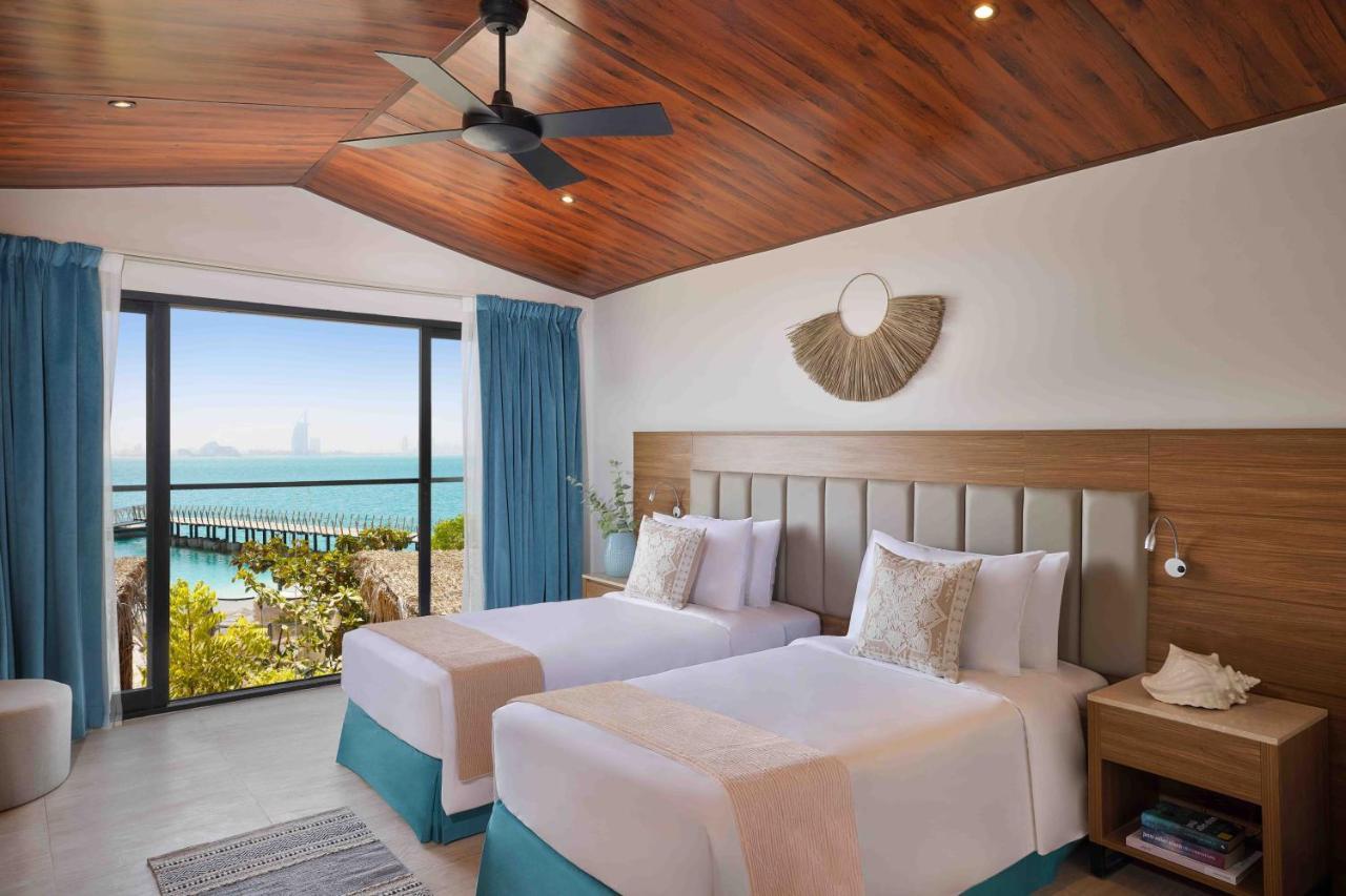 Habitación Doble con vistas al mar - 1 cama extragrande o 2 individuales