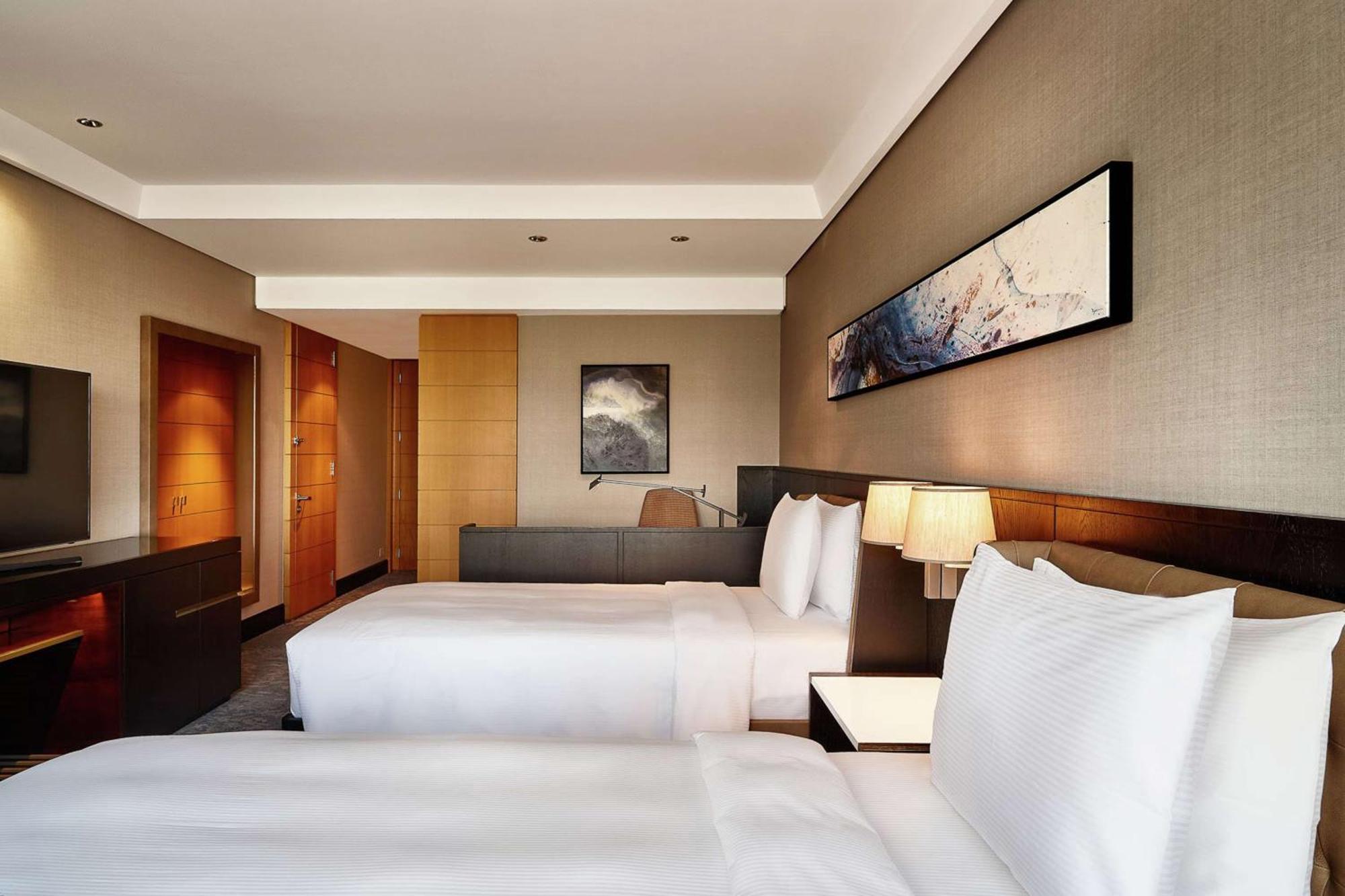 Quarto Premium com 2 Camas de Solteiro