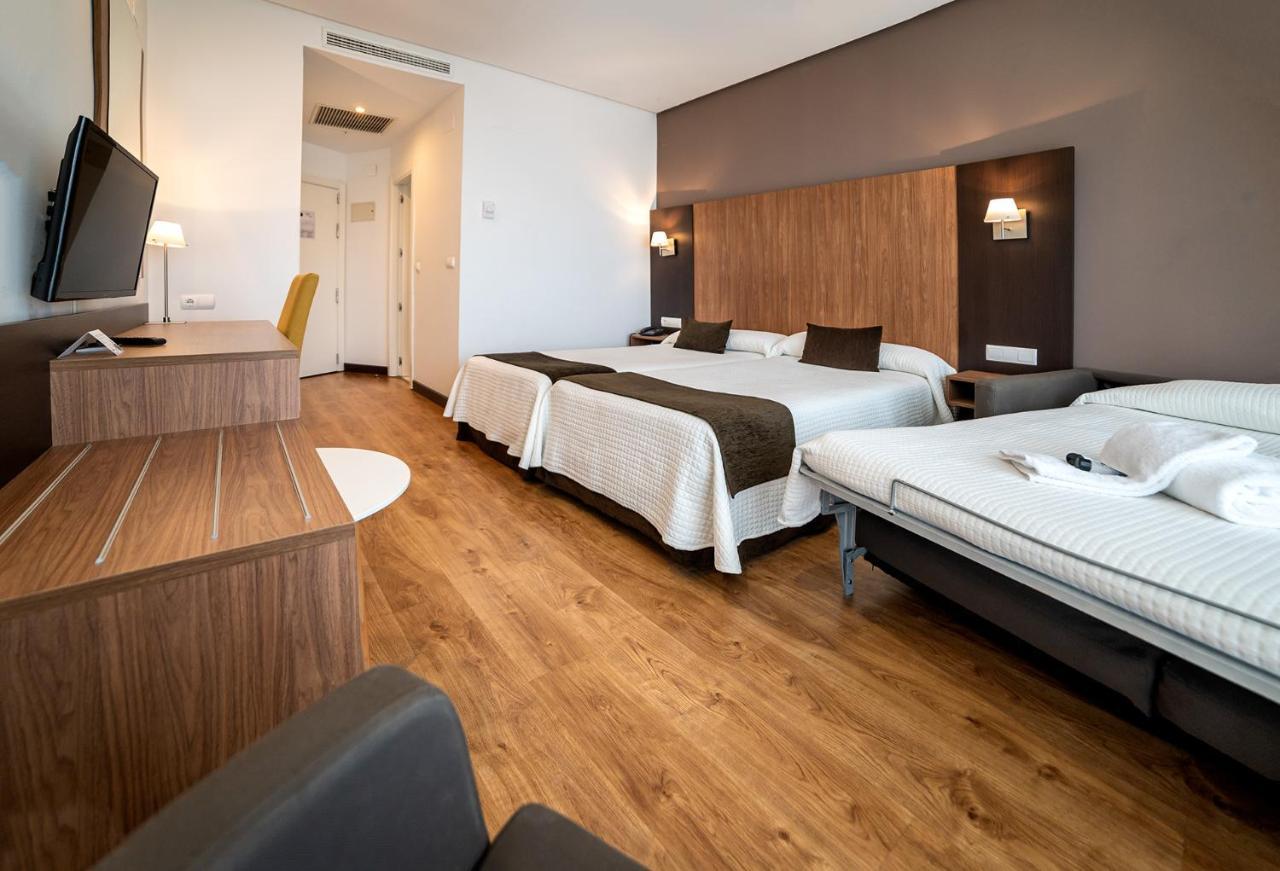 Double or Twin Room (2 Adults + 1 Child),1399015523:JPEG