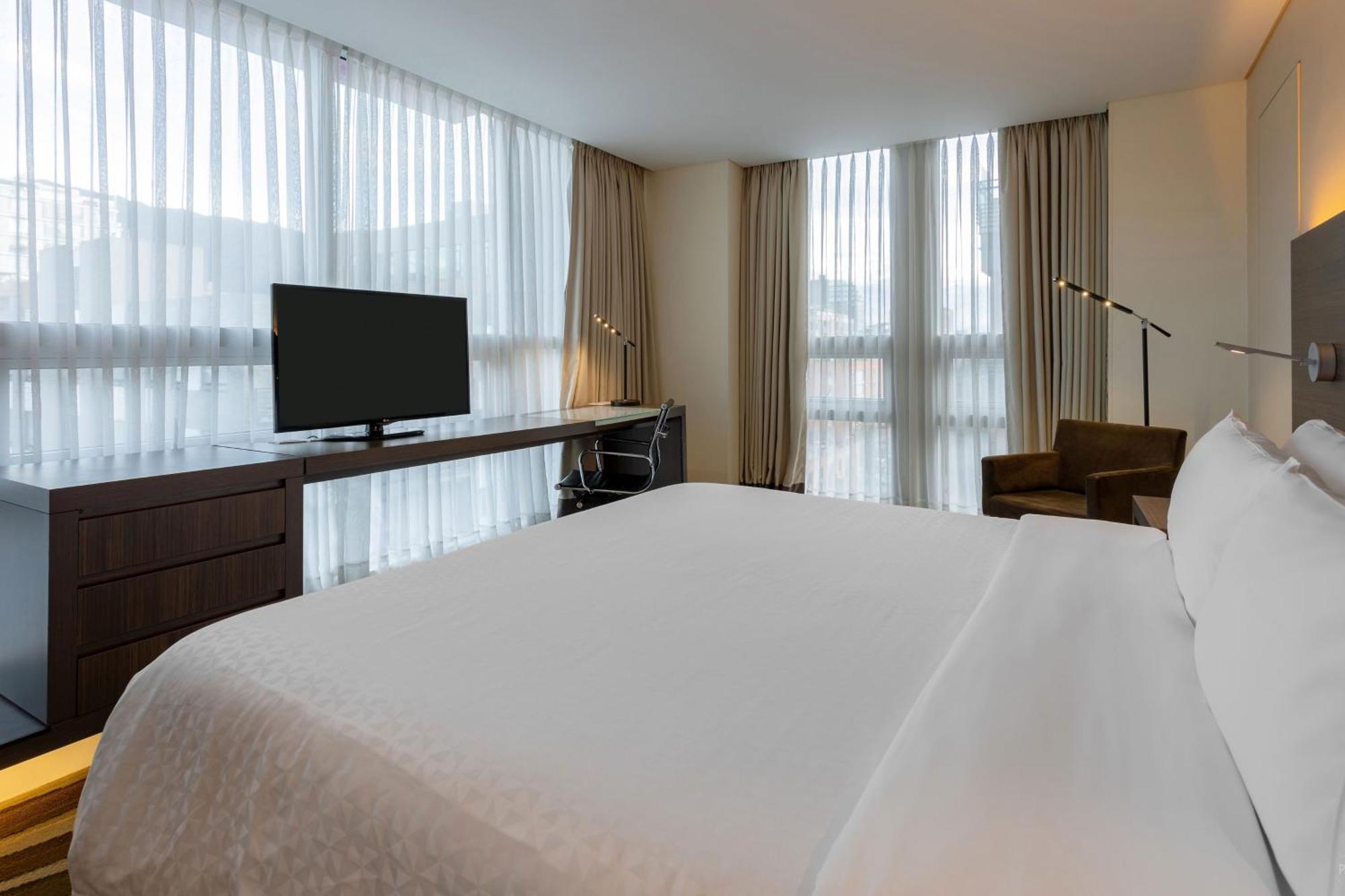 Executive con cama extragrande