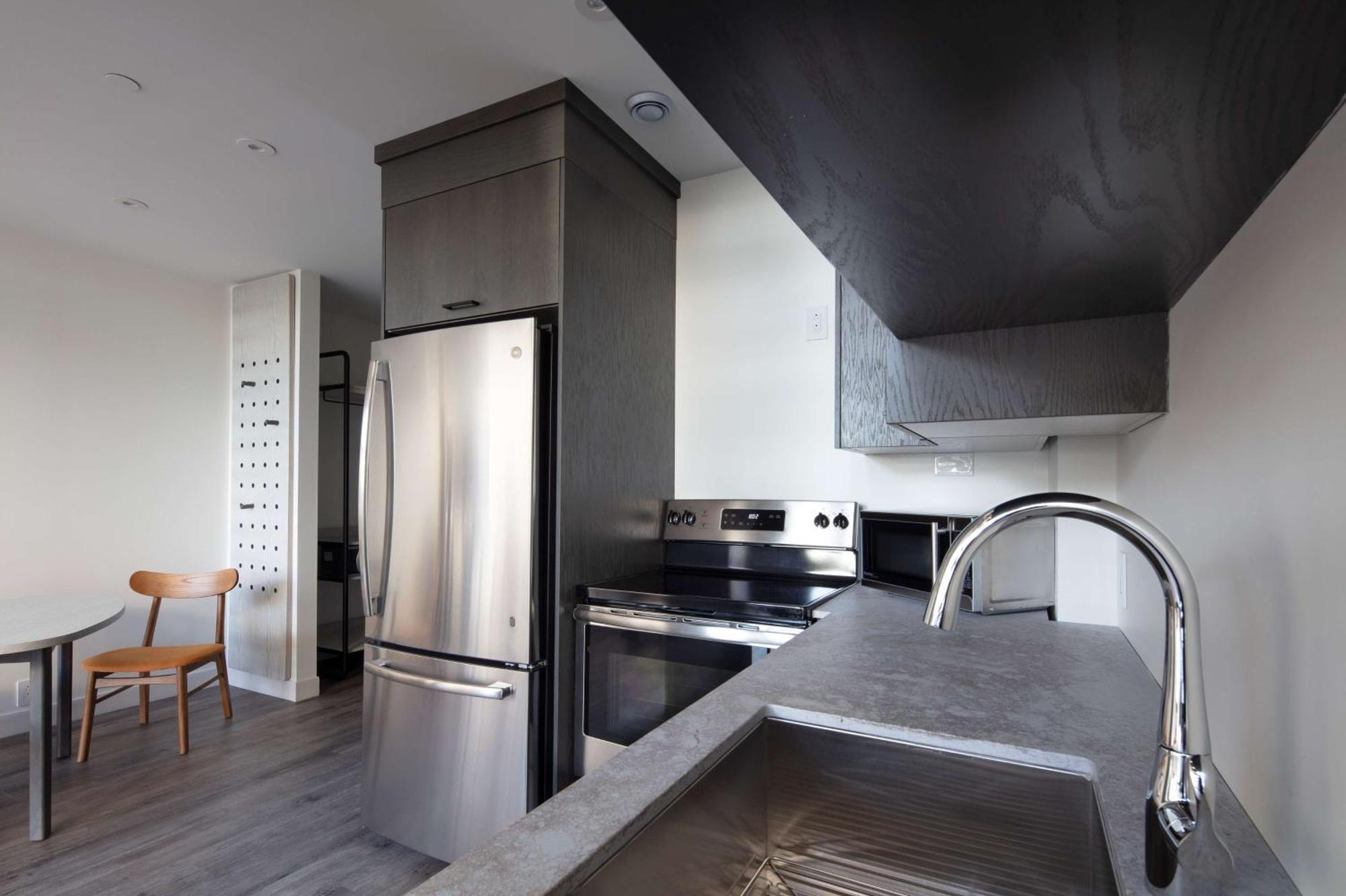 Two-Level King Suite with Balcony and Kitchen,1551460105:JPEG