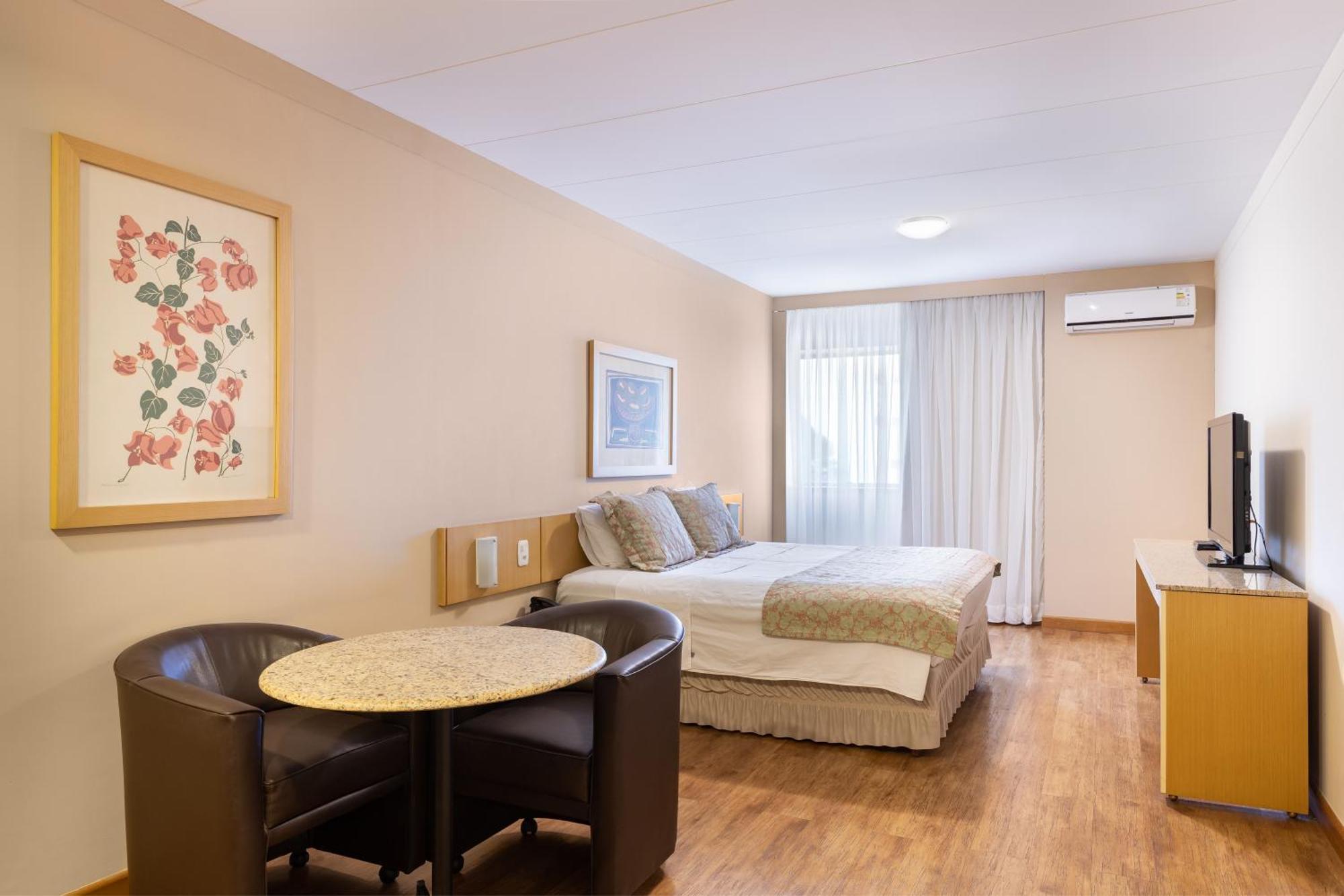Quarto Duplo de Luxo com Cama de Casal