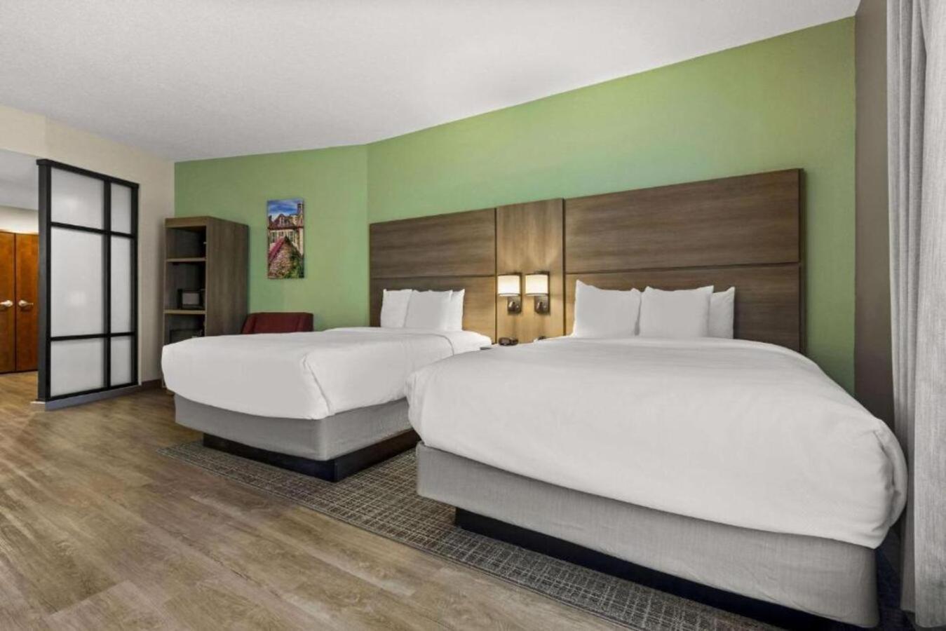 Efficiency Suite Two Queen Beds Sofabed Accessible Tub Accessible or Non-Smoking