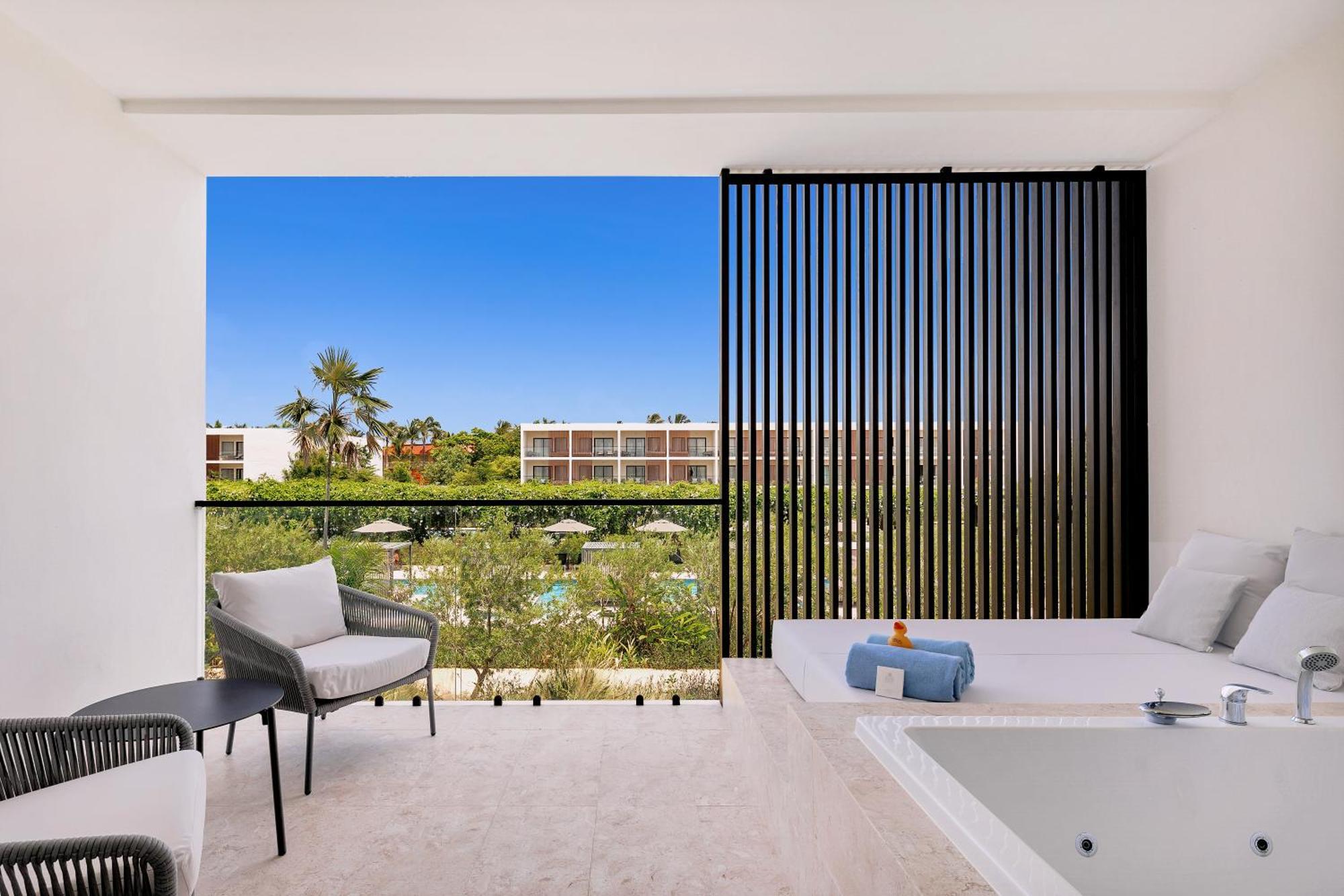 Suite Junior con vistas a la piscina - 1 cama extragrande