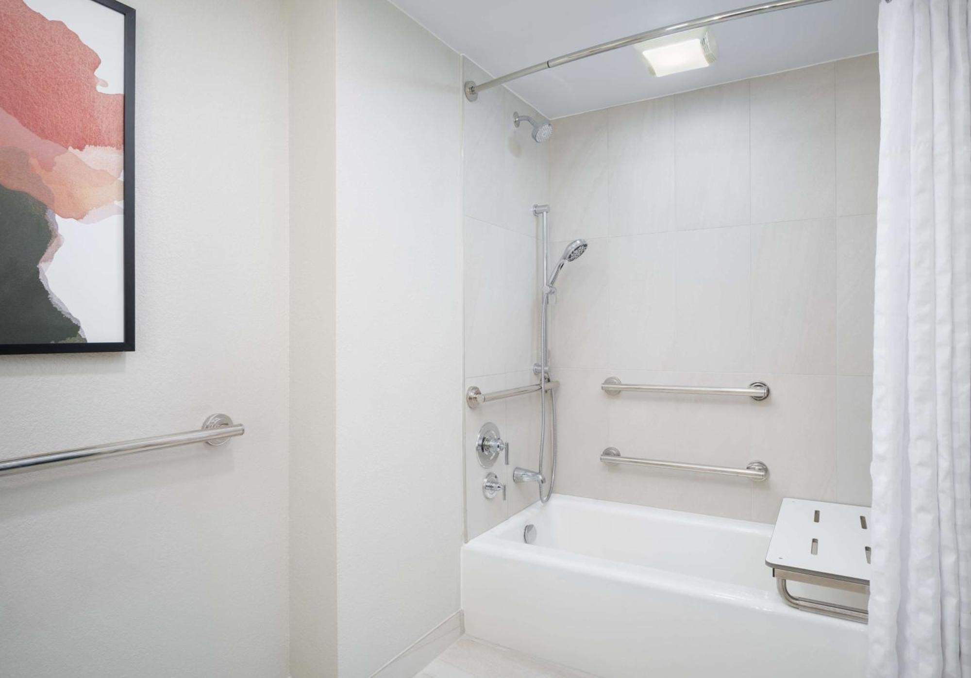 Two-Room King Suite Bath Tub Mobility Accessible