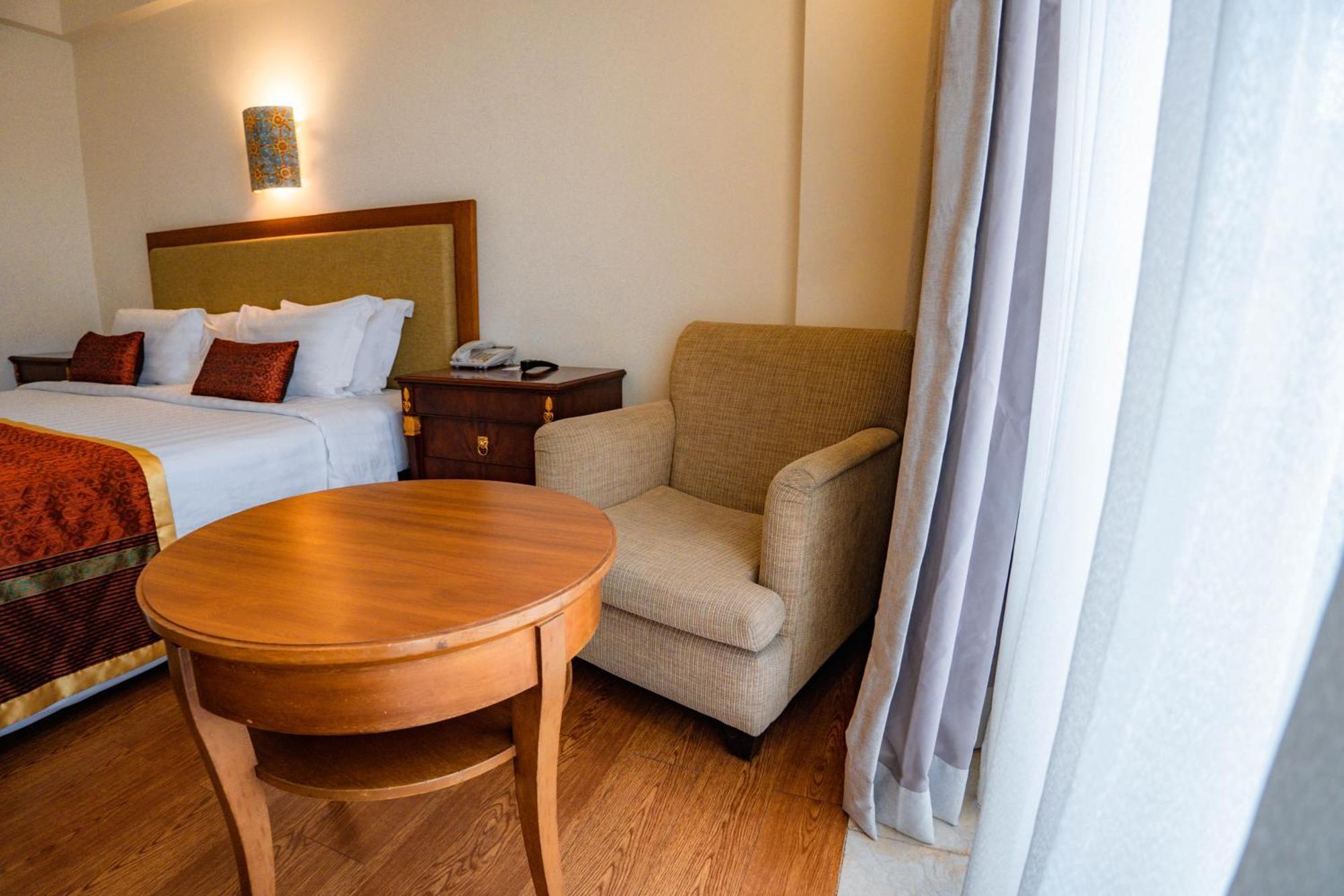 Deluxe Double or Twin Room Airport Transfer