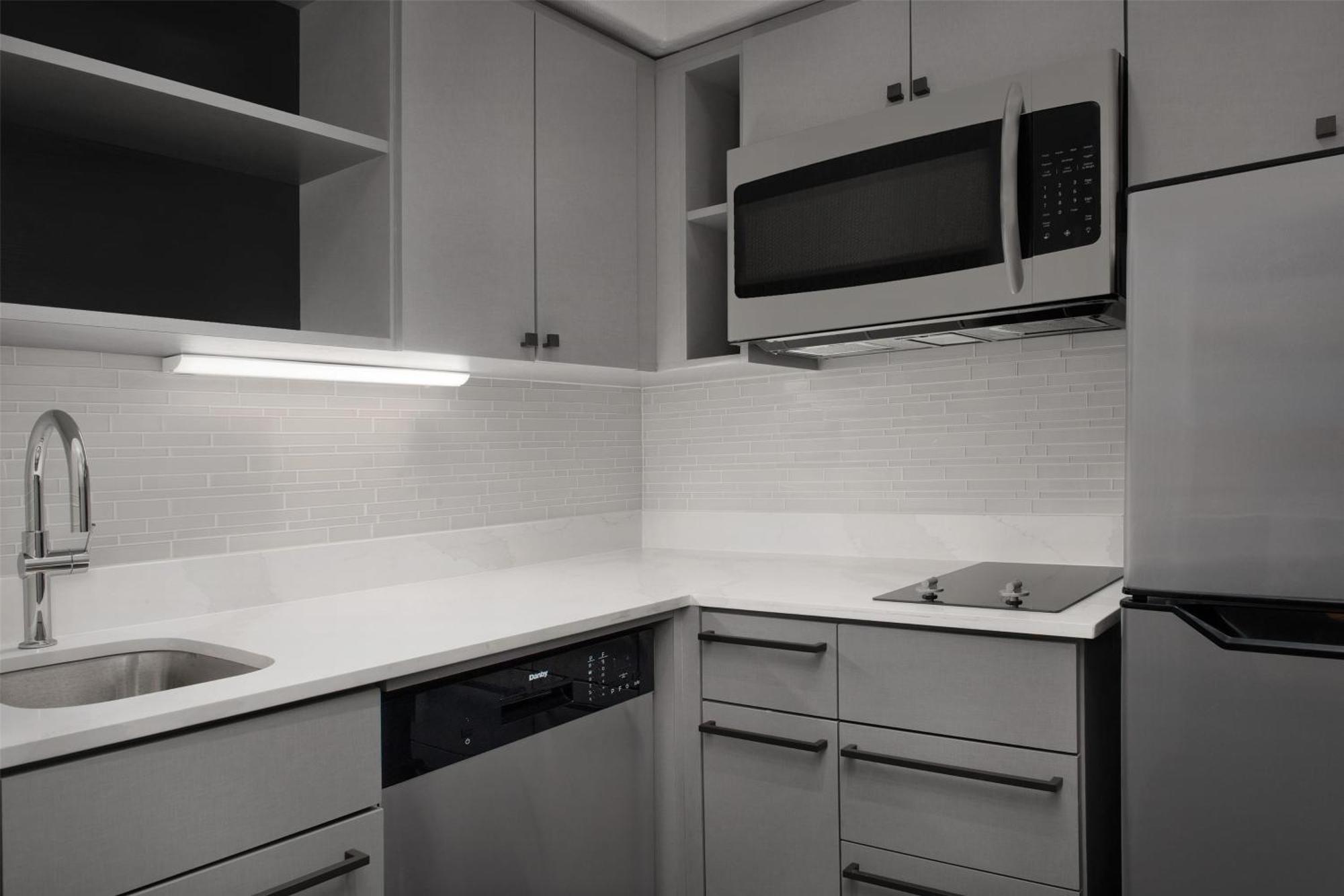 Two-Bedroom Suite with One King And Two Double Beds - Non-Smoking,1676737125:JPEG