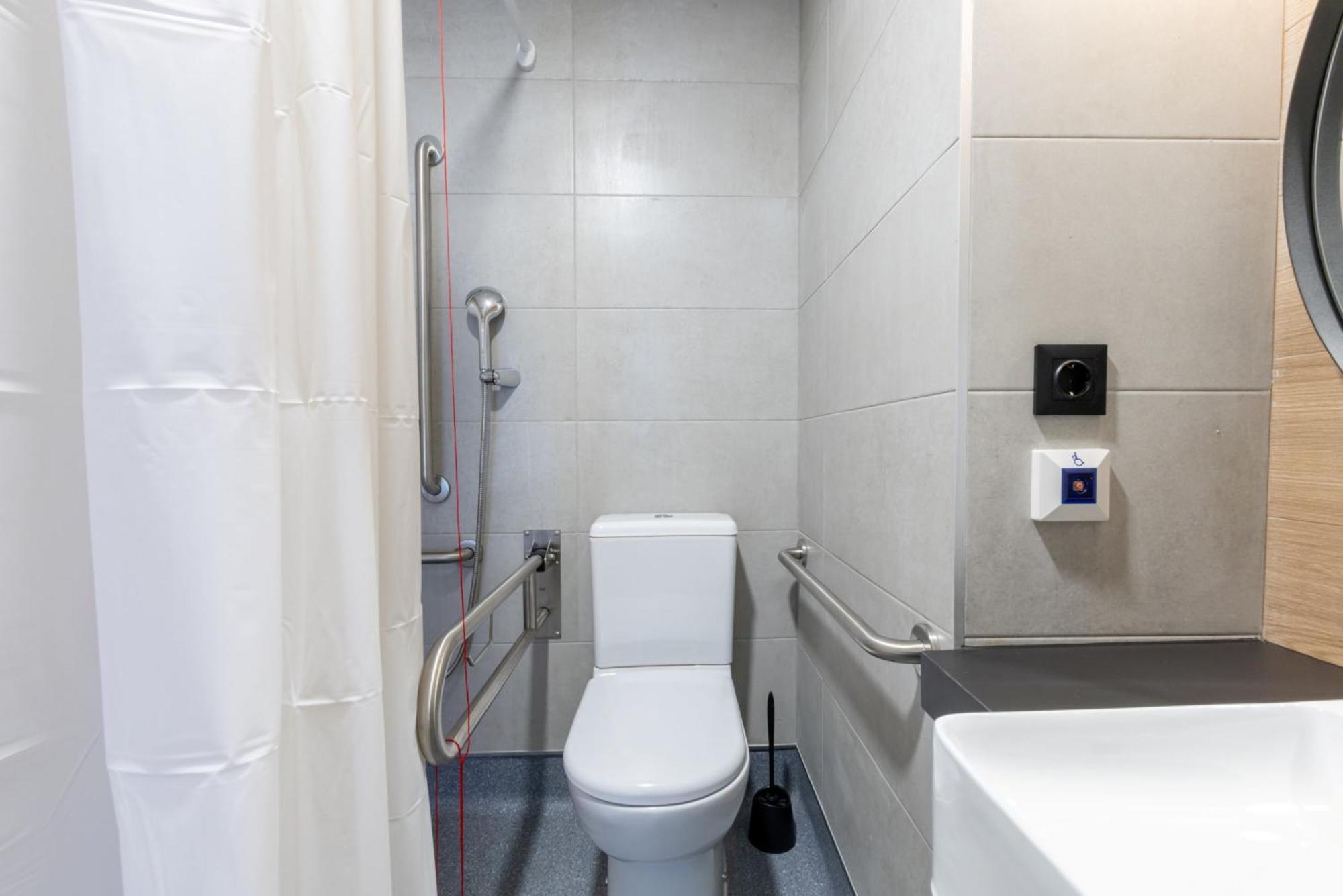 One-bedroom apartment a partially accessible bathroom