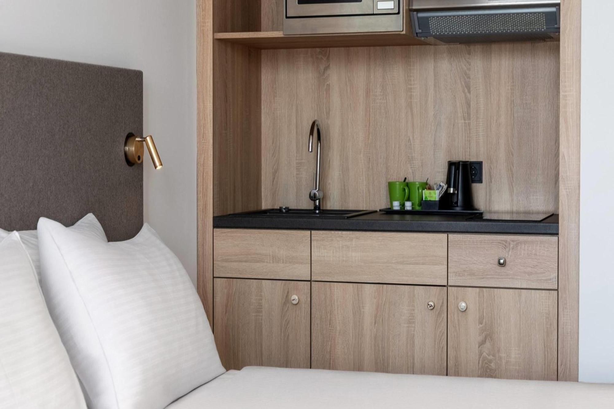 Superior Twin Room with Kitchenette and Balcony - Non-Smoking,1708285059:JPEG