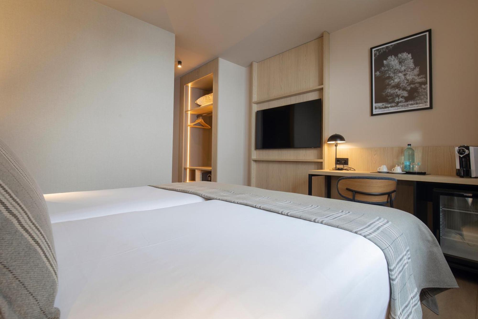Triple Room (2 Adults + 1 Child)