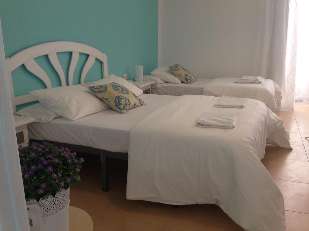 Economy Quadruple Room with Shared Bathroom,965537935:JPEG