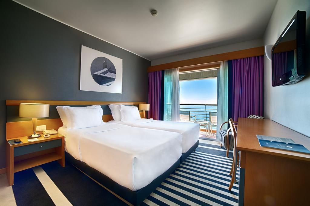 Double or Twin Room with Sea View,443910585:JPEG