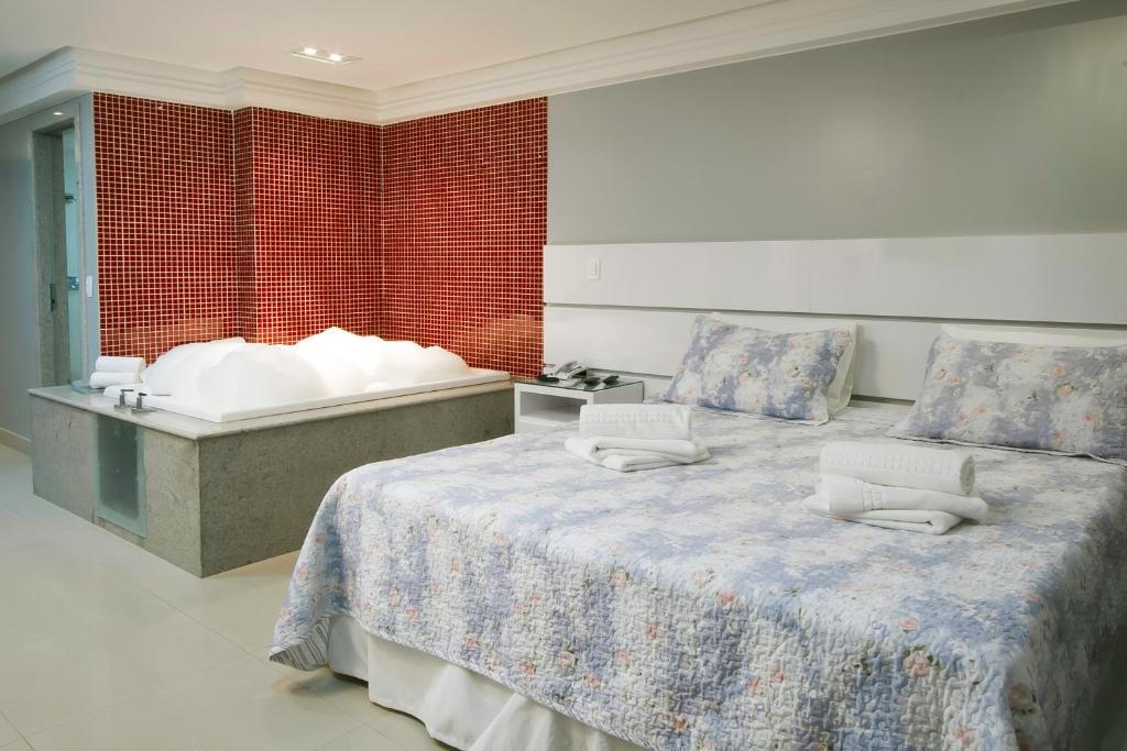 Quarto Duplo com Banheira de Hidromassagem