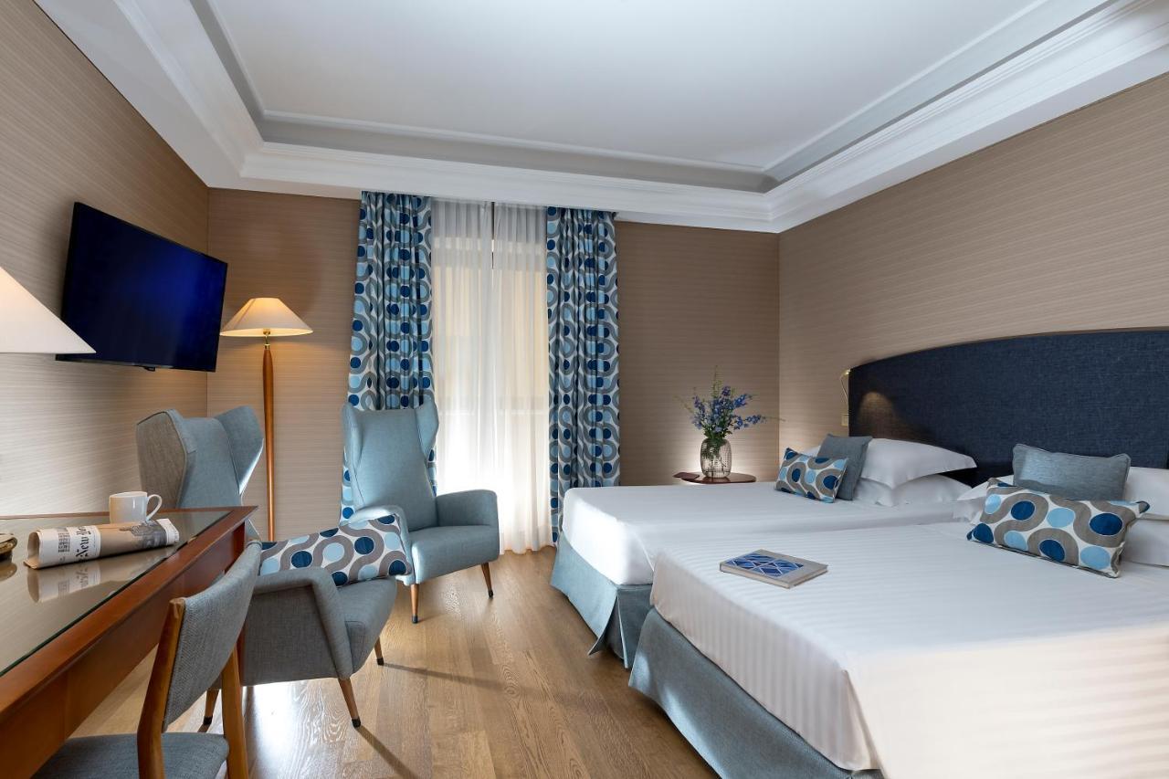 Quarto Clássico com Cama de Casal ou 2 de Solteiro